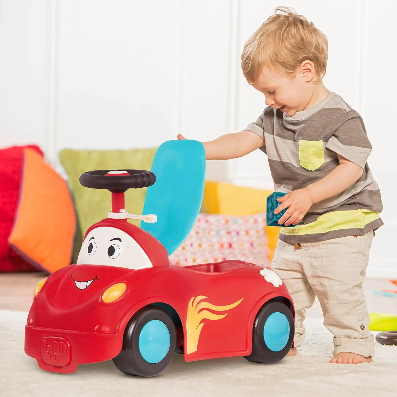 B. toys – Push CarToy – Ride-On Race Car –Walker Toy - Handle & Storage Space – Lights, Songs & Sounds – 1 Year   – Rollin' Riders - Freddy Zoom