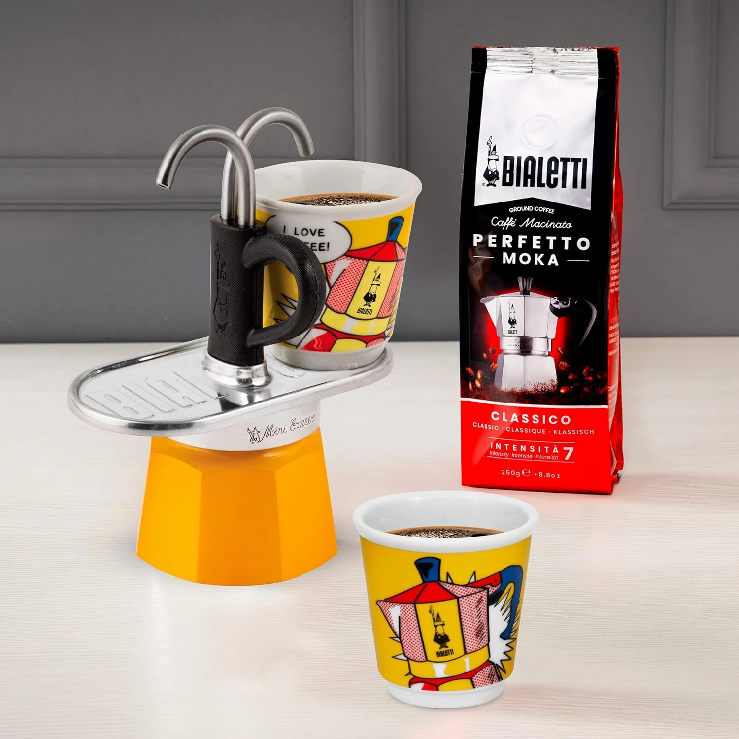 Bialetti - Mini Express Lichtenstein: Moka Set includes Coffee Maker 2-Cup (2.8 Oz)   2 shot glasses, Yellow, Aluminium